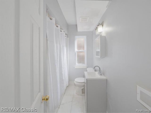 bathroom with toilet, vanity, marble look tile flooring, and a shower with shower curtain