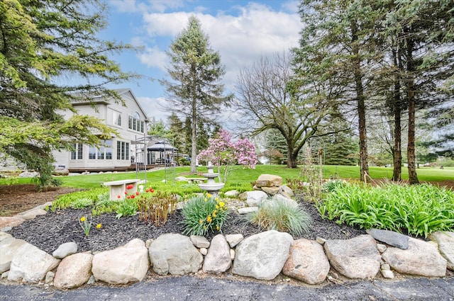 view of grassy yard with a gazebo