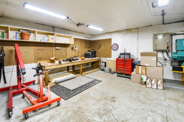 basement with a workshop area