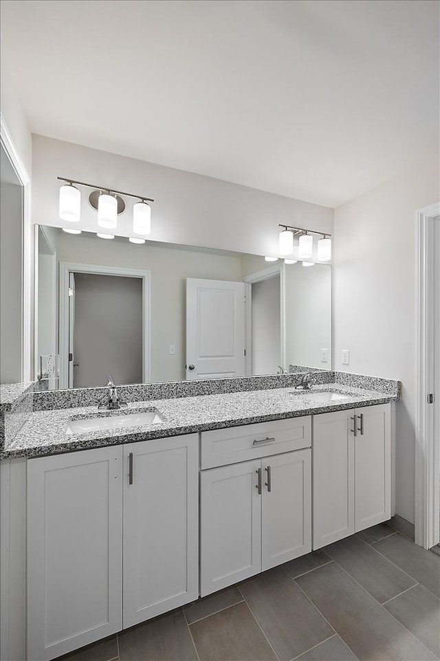 full bathroom with double vanity