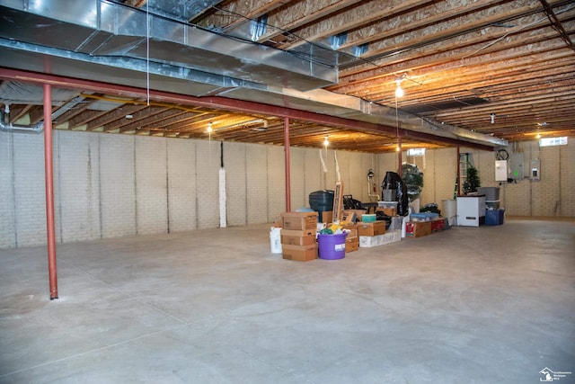 unfinished below grade area featuring electric panel