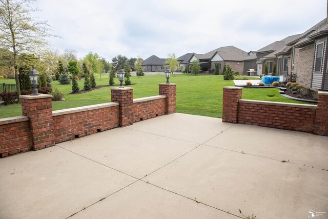 view of patio featuring a residential view