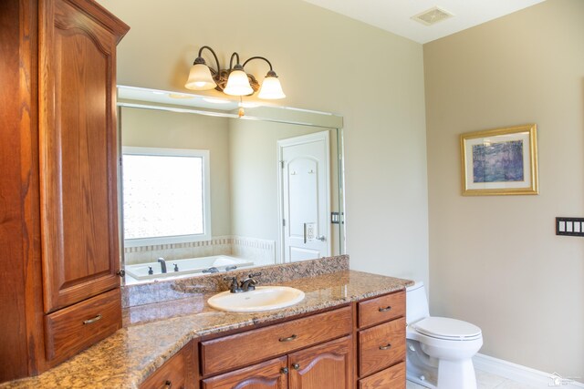 full bath featuring toilet, tile patterned flooring, a bath, and vanity