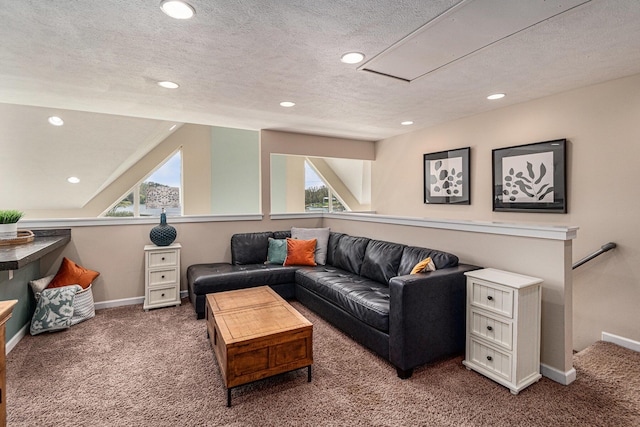 7379 Wimpole Dr NE, Belding, MI 48809 - carpeted living area featuring attic access, recessed lighting, baseboards, and a textured ceiling
