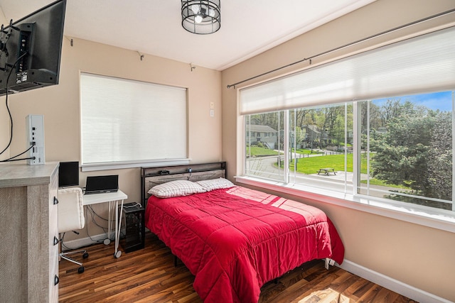 7379 Wimpole Dr NE, Belding, MI 48809 - bedroom with wood finished floors and baseboards
