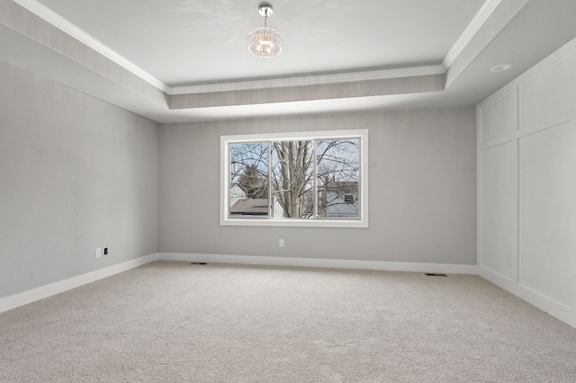 53302 Zachary Dr, Chesterfield, MI 48047 - carpeted spare room featuring ornamental molding, a tray ceiling, a chandelier, and baseboards