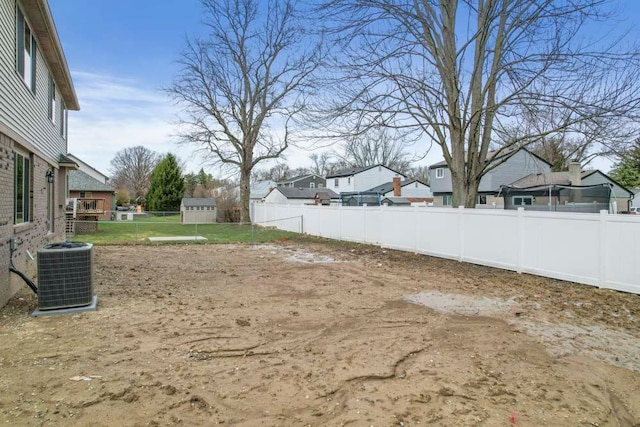 53302 Zachary Dr, Chesterfield, MI 48047 - fenced backyard featuring central air condition unit and a residential view