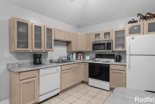 16153 Krob Rd, Union Pier, MI 49129 - kitchen with white appliances, a sink, light brown cabinets, lofted ceiling, and light tile patterned floors