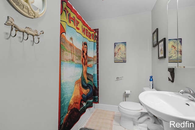 16153 Krob Rd, Union Pier, MI 49129 - full bath with tile patterned floors, toilet, a shower with curtain, a sink, and baseboards