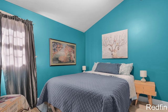16153 Krob Rd, Union Pier, MI 49129 - bedroom with wood finished floors, vaulted ceiling, and baseboards