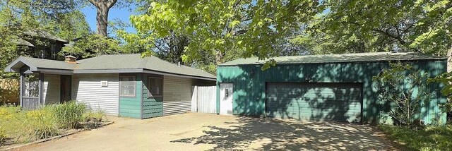 16153 Krob Rd, Union Pier, MI 49129 - view of front of property featuring an outdoor structure, a garage, and driveway