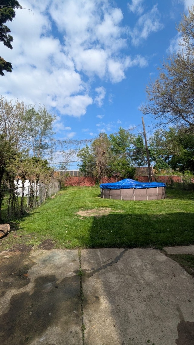 19205 Stanley St, Melvindale, MI 48122 - view of yard with a swimming pool and a patio