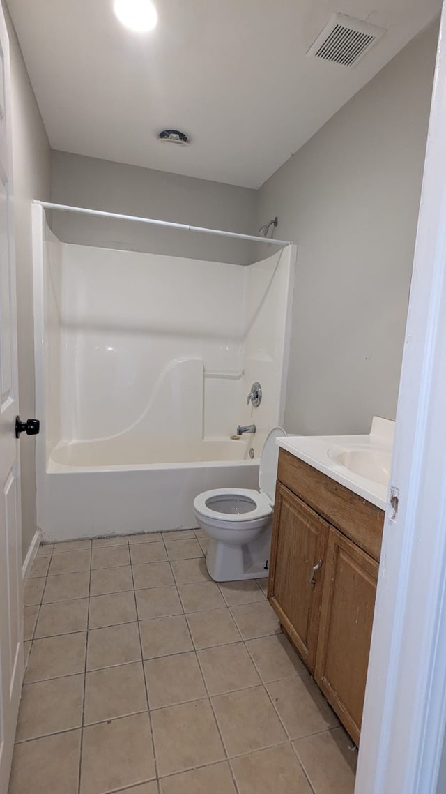 19205 Stanley St, Melvindale, MI 48122 - full bathroom with tile patterned floors, bathtub / shower combination, toilet, and vanity
