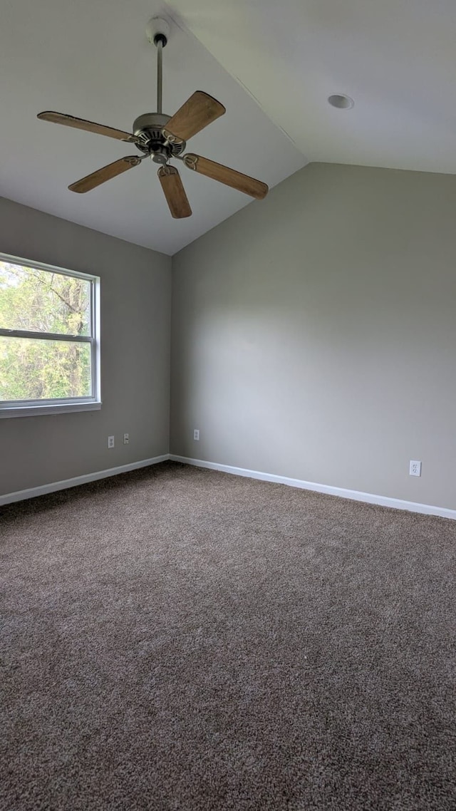 19205 Stanley St, Melvindale, MI 48122 - carpeted empty room featuring lofted ceiling, baseboards, and ceiling fan