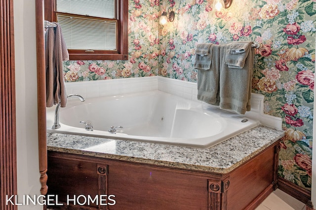 223 E Savidge St, Spring Lake, MI 49456 - bathroom with wallpapered walls and a whirlpool tub
