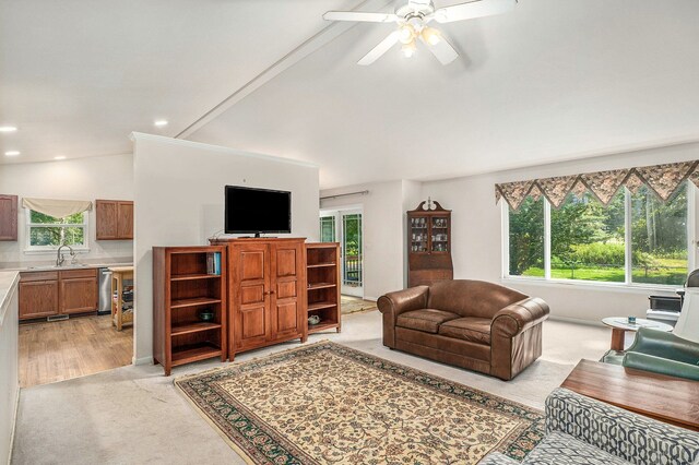 living room featuring lofted ceiling, light carpet, recessed lighting, and a ceiling fan