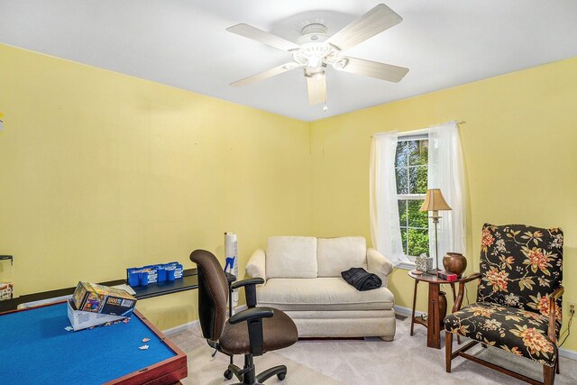 home office featuring carpet, baseboards, and ceiling fan