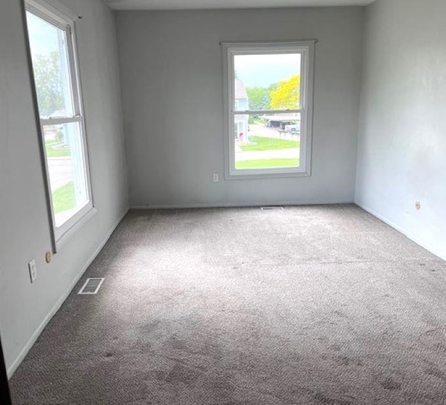 9455 N Parkwood Dr, Davison, MI 48423 - carpeted empty room with baseboards