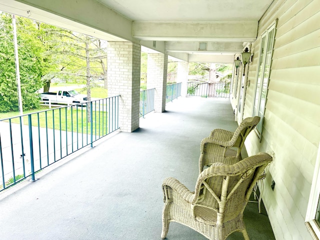103 Lukesport Dr, Quincy, MI 49082 - view of patio featuring covered porch