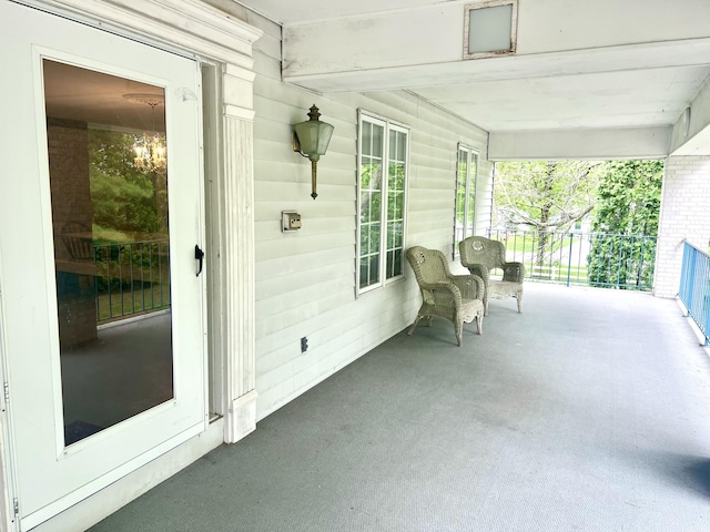 103 Lukesport Dr, Quincy, MI 49082 - view of patio / terrace featuring a porch