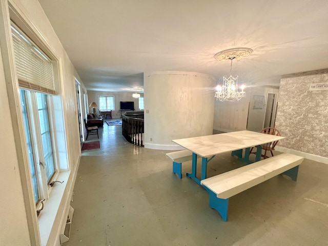 103 Lukesport Dr, Quincy, MI 49082 - dining area with a chandelier
