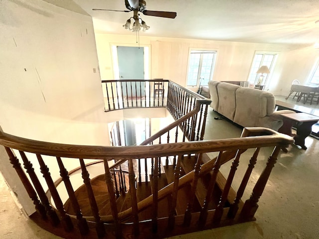 103 Lukesport Dr, Quincy, MI 49082 - staircase featuring a ceiling fan and carpet