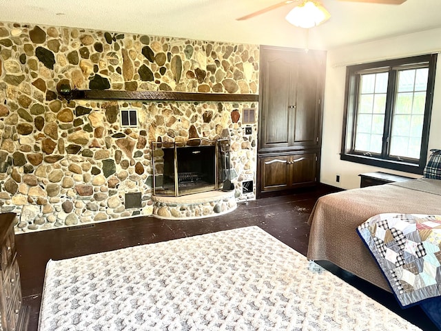103 Lukesport Dr, Quincy, MI 49082 - bedroom featuring a fireplace and ceiling fan