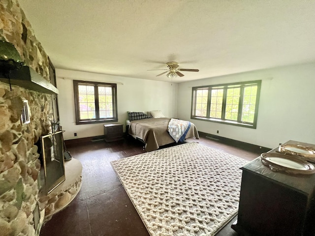 103 Lukesport Dr, Quincy, MI 49082 - bedroom with dark wood-style flooring, baseboards, and ceiling fan