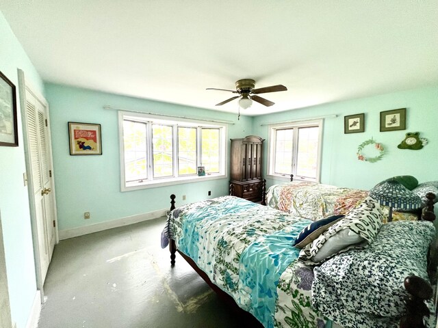 103 Lukesport Dr, Quincy, MI 49082 - bedroom featuring baseboards and ceiling fan