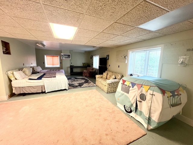 103 Lukesport Dr, Quincy, MI 49082 - bedroom featuring a drop ceiling, baseboards, and multiple windows
