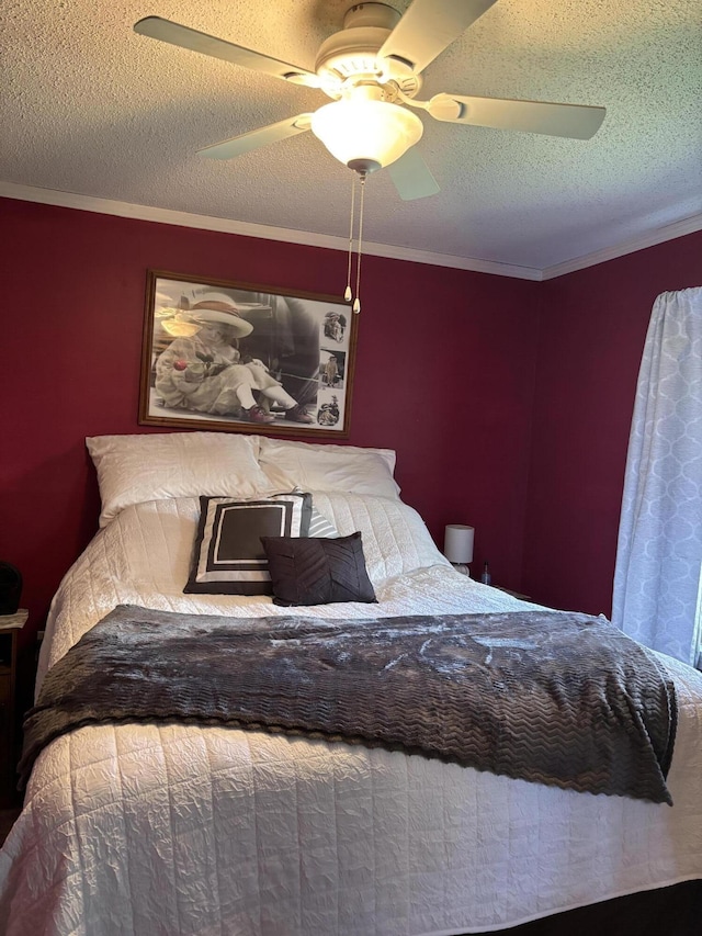410 S Union St, Hart, MI 49420 - bedroom featuring a textured ceiling, a ceiling fan, and crown molding