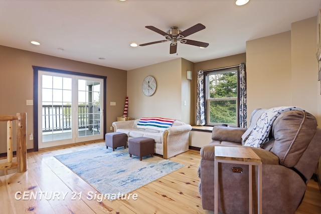 730 S Point Rd, Gladwin, MI 48624 - living area with recessed lighting, light wood finished floors, ceiling fan, and baseboards