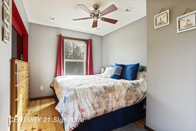 730 S Point Rd, Gladwin, MI 48624 - bedroom featuring wood finished floors, recessed lighting, a ceiling fan, and baseboards