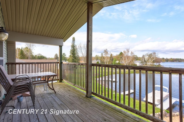 730 S Point Rd, Gladwin, MI 48624 - wooden terrace with a water view