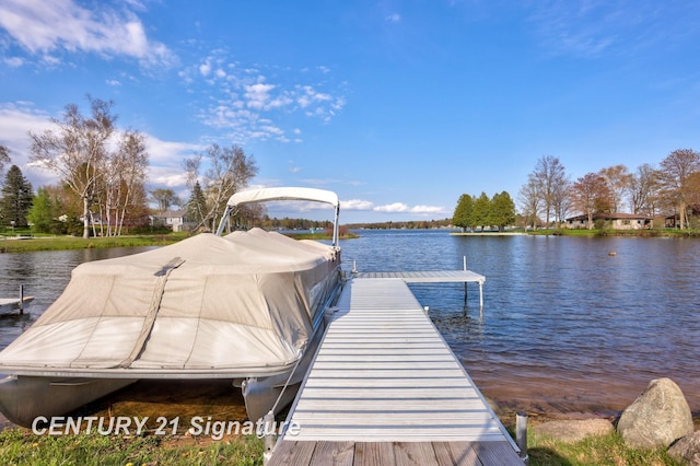 730 S Point Rd, Gladwin, MI 48624 - dock area featuring a water view