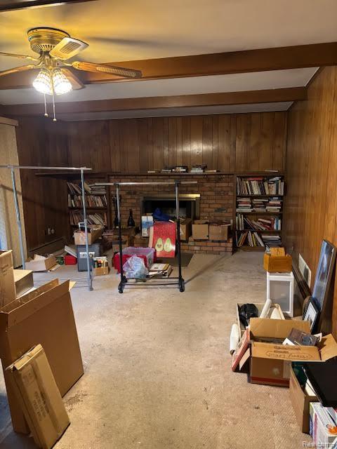 25370 Chapelweigh Dr, Farmington Hills, MI 48336 - below grade area featuring wooden walls, a ceiling fan, and carpet