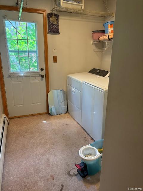 25370 Chapelweigh Dr, Farmington Hills, MI 48336 - laundry room with washer and clothes dryer, a baseboard heating unit, and light colored carpet