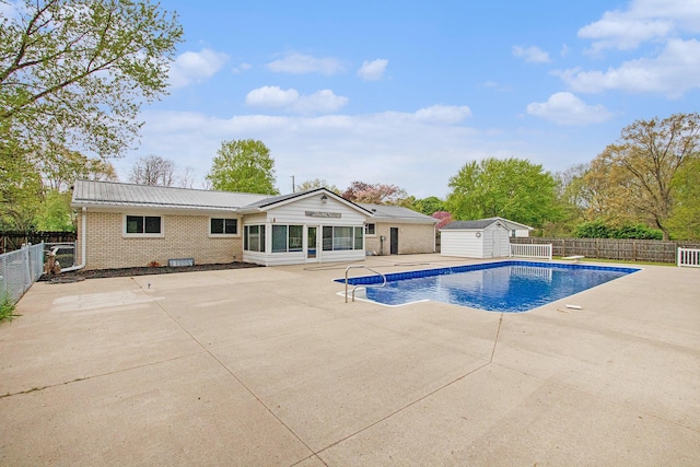 1507 Pinehurst Ln, Niles, MI 49120 - view of pool with a patio, fence, an outdoor structure, and a storage unit