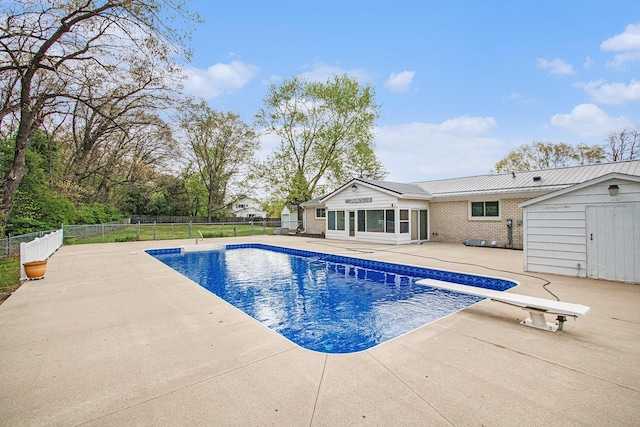 1507 Pinehurst Ln, Niles, MI 49120 - view of swimming pool featuring a patio area, fence, a storage shed, and an outdoor structure