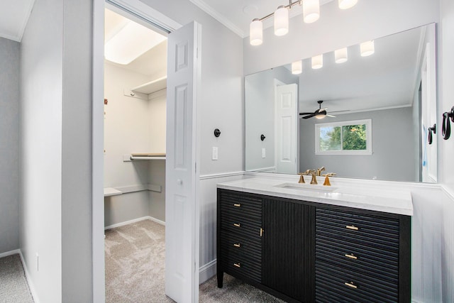 1507 Pinehurst Ln, Niles, MI 49120 - bathroom featuring crown molding, ceiling fan, vanity, and baseboards