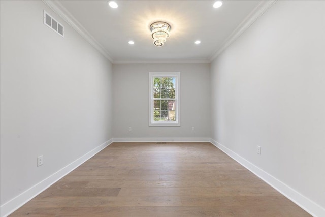 3408 Eastern Ave, Rochester Hills, MI 48307 - spare room featuring crown molding, light wood-style flooring, recessed lighting, and baseboards