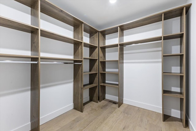 3408 Eastern Ave, Rochester Hills, MI 48307 - walk in closet with wood finished floors