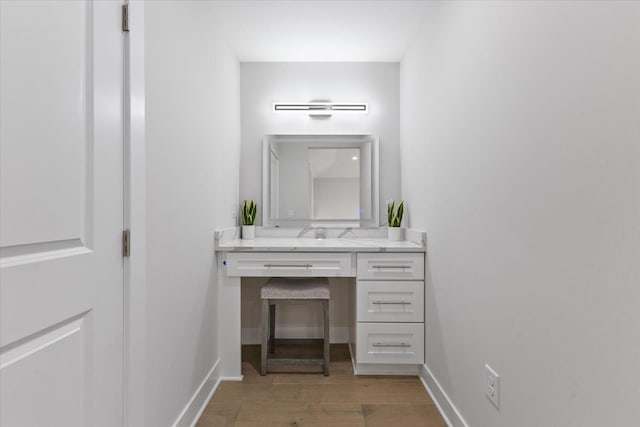 3408 Eastern Ave, Rochester Hills, MI 48307 - bathroom featuring vanity, wood finished floors, and baseboards