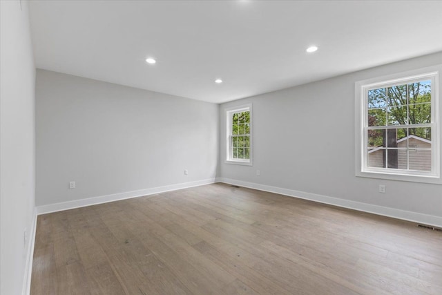 3408 Eastern Ave, Rochester Hills, MI 48307 - unfurnished room with wood finished floors, recessed lighting, and baseboards