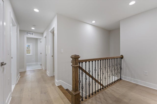 3408 Eastern Ave, Rochester Hills, MI 48307 - hallway with an upstairs landing, light wood finished floors, recessed lighting, and baseboards