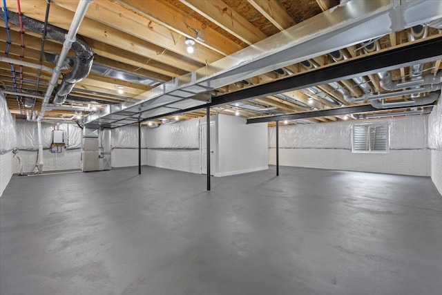 3408 Eastern Ave, Rochester Hills, MI 48307 - unfinished below grade area with heating unit and brick wall