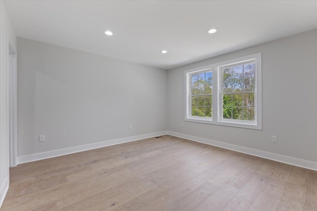 3408 Eastern Ave, Rochester Hills, MI 48307 - empty room featuring light wood-style flooring, recessed lighting, and baseboards