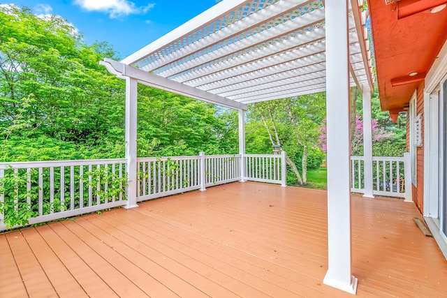 wooden deck featuring a pergola