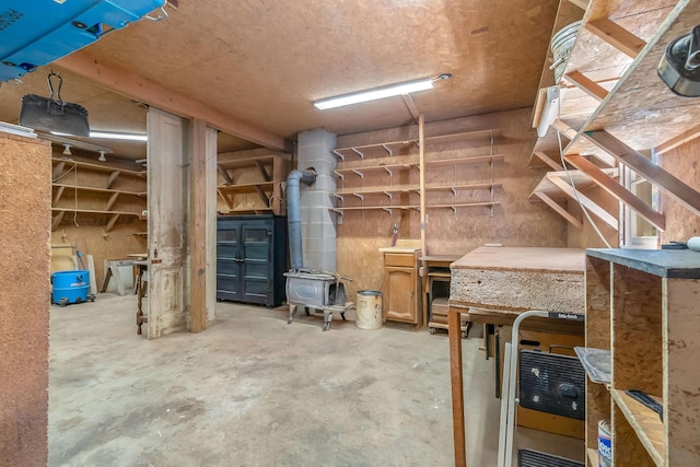 below grade area featuring a wood stove