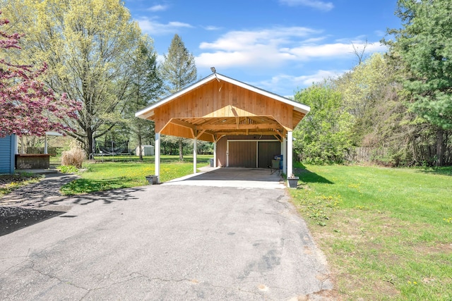 4953 Clintonville Rd, Clarkston, MI 48346 - view of parking featuring a carport and driveway
